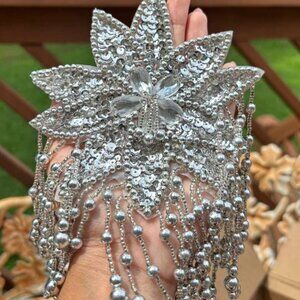 A MEGAS BROOCH OR A HOLIDAY STAR